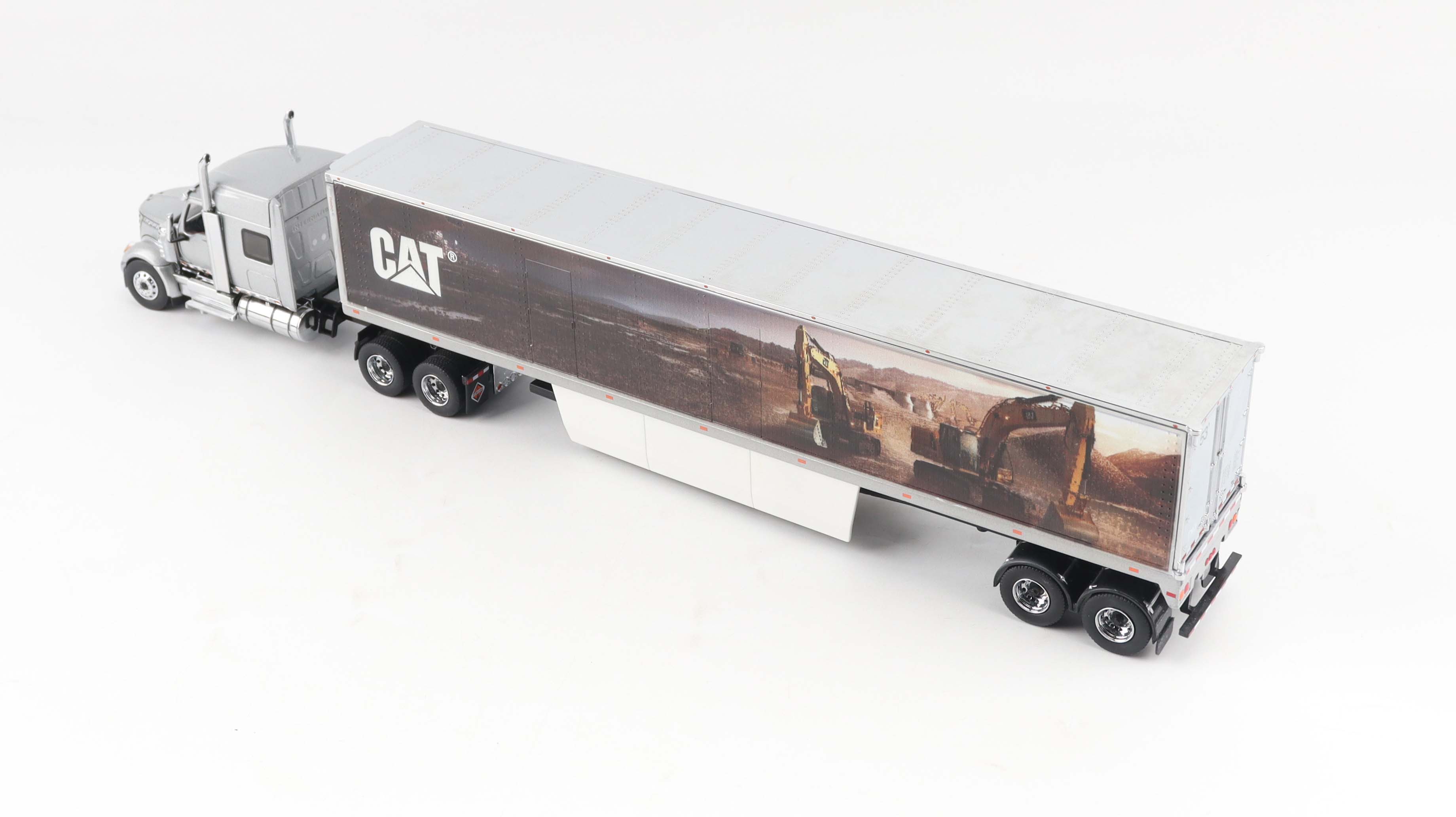 Lonestar mit Bagger-Grafiken Modell von DieCast Masters 1:50