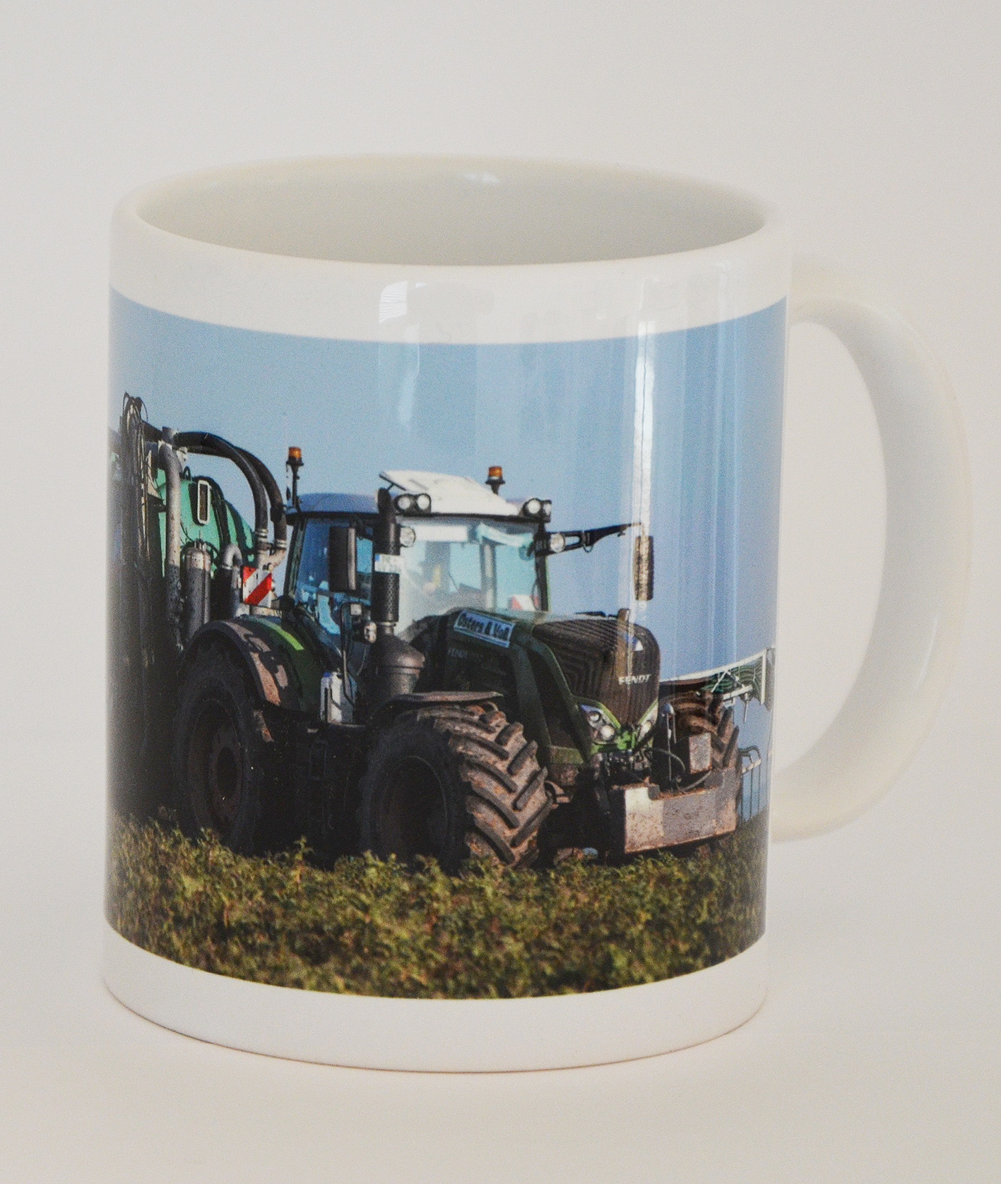 Becher Fendt 939 mit Wienhoff Güllefass