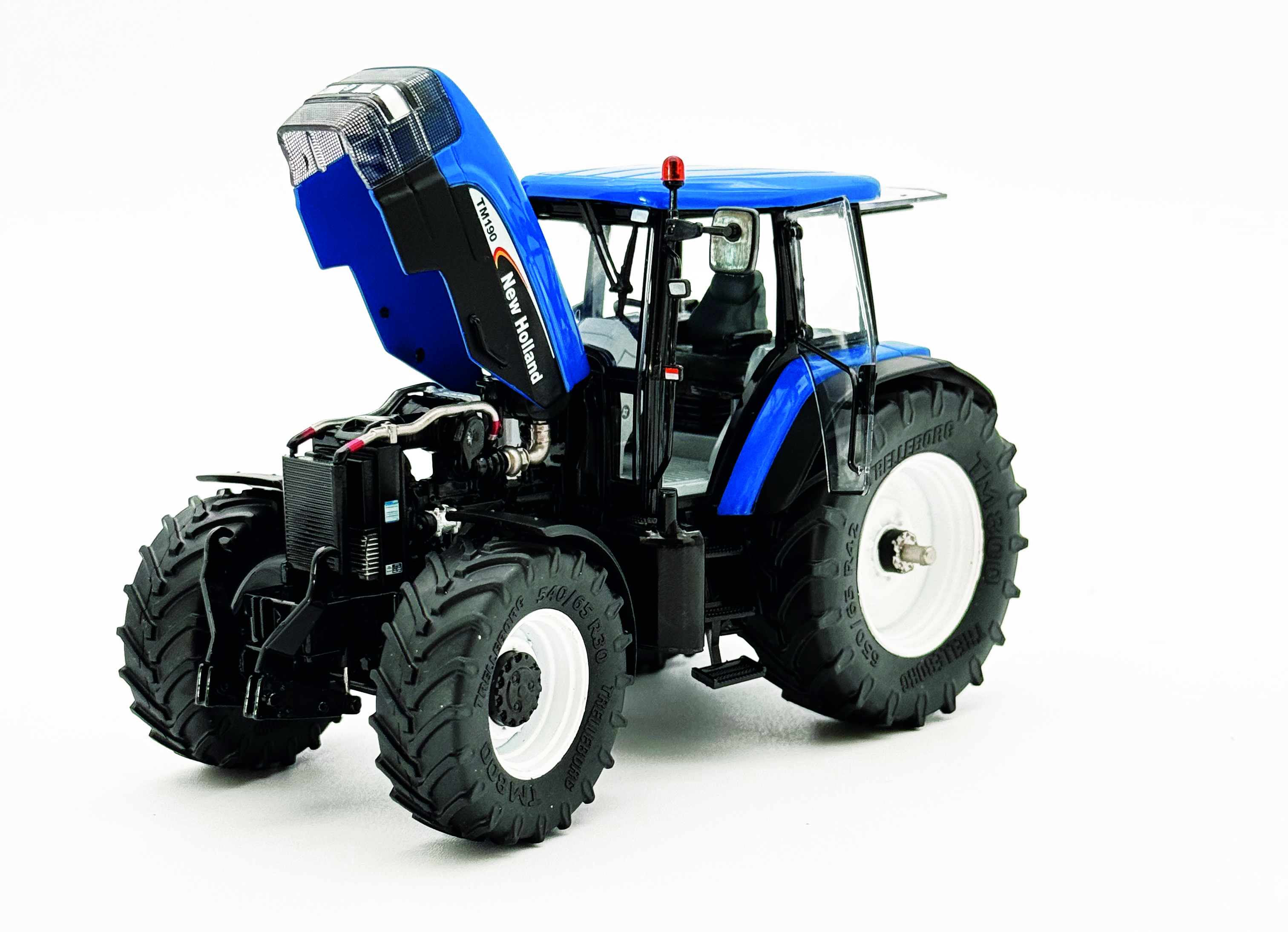 New Holland TM 190 G1 mit Fronthydraulik Modell von Ros 1:32