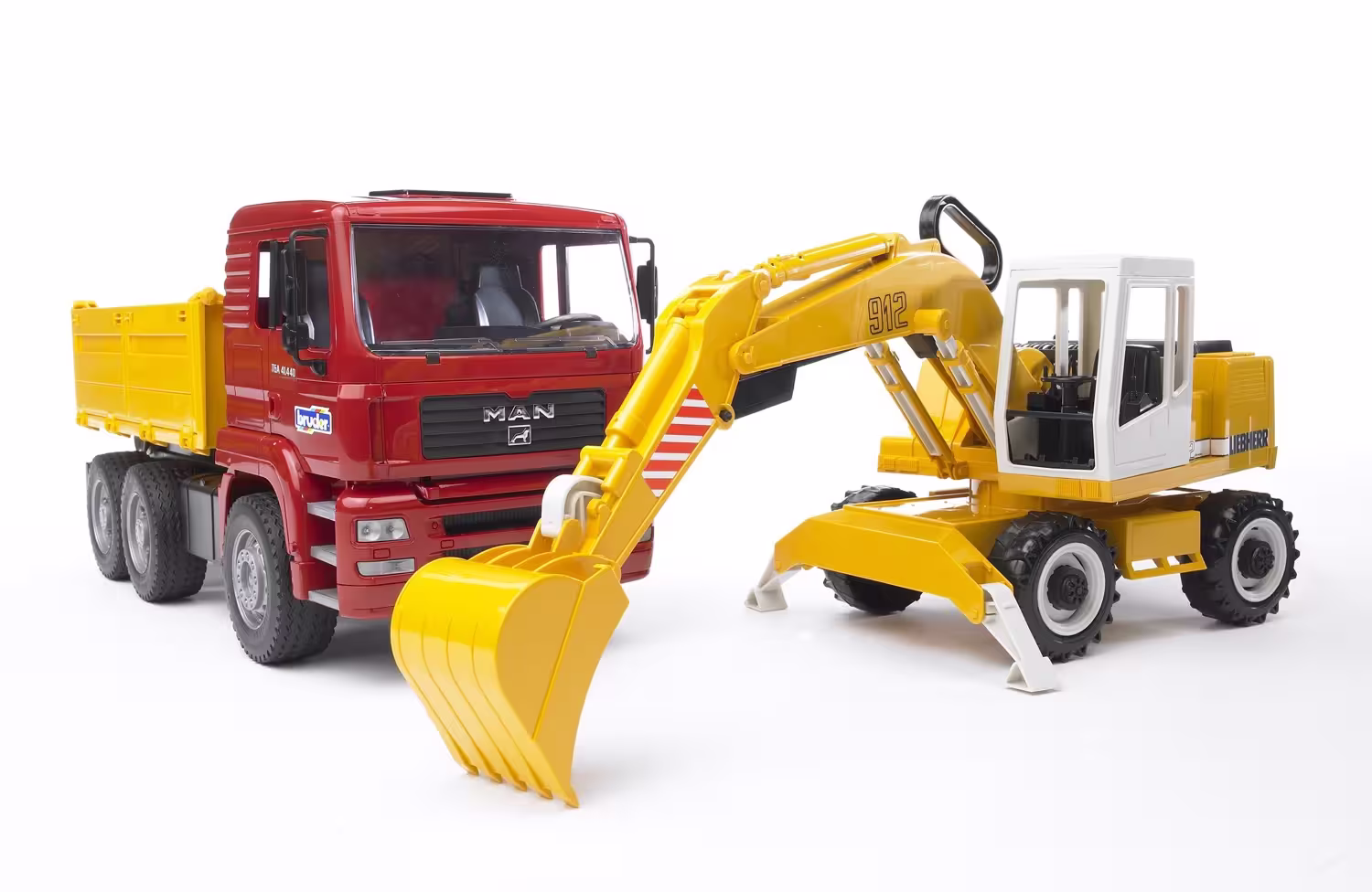 MAN TGA Kipplastwagen mit Liebherr Schaufelbagger eilbote-onlineshop - Agrarfox