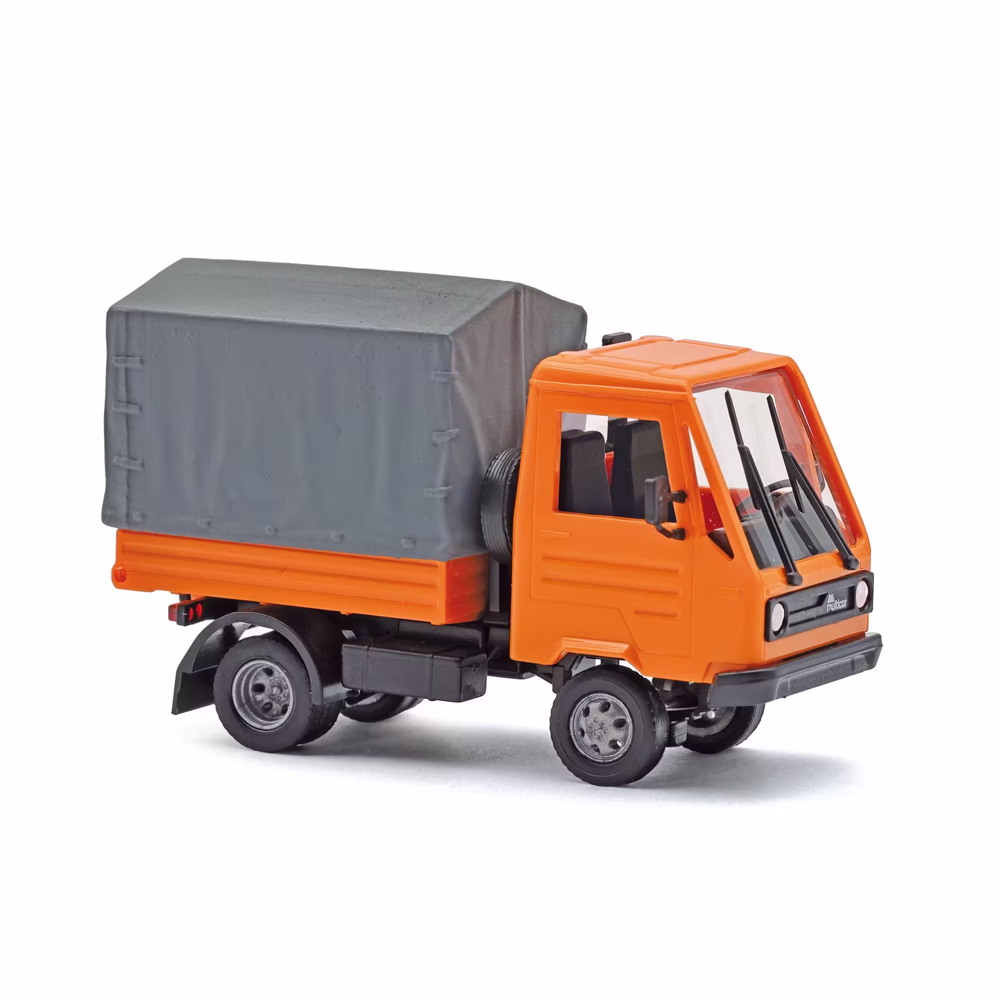 MA76351-1 Artikelname: Multicar M26 mit Pritsche/Plane, Orange Originalhersteller: Multicar Modelltyp: M26 von Busch im Maßstab: 1:87