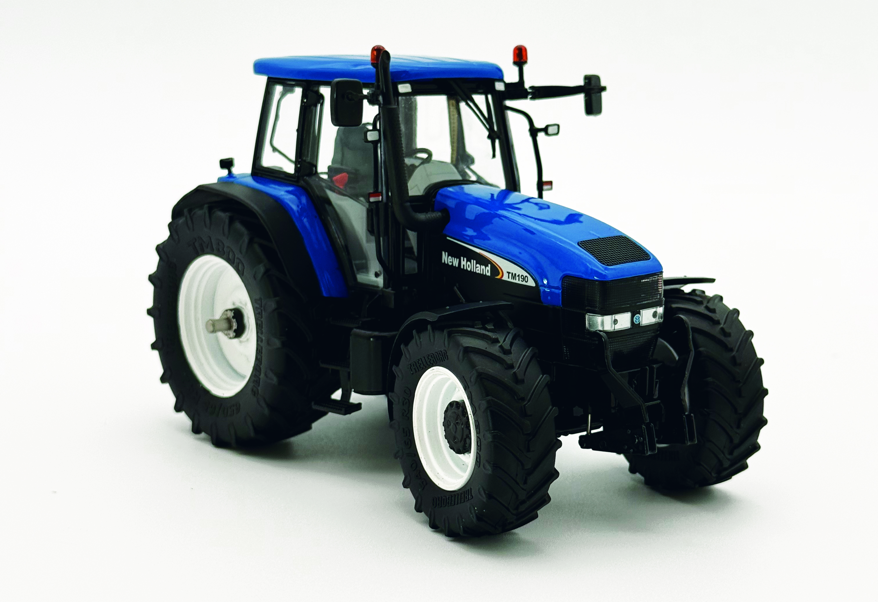 New Holland TM 190 G1 mit Fronthydraulik Modell von Ros 1:32